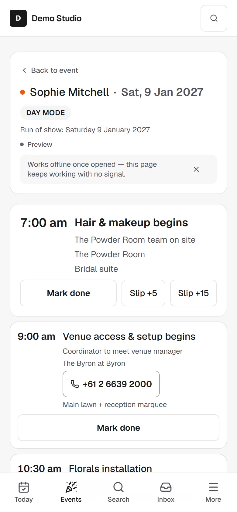 Day Mode on a phone, showing a notice that the page works offline once opened, then the run of show with Mark done and Slip buttons on each item.